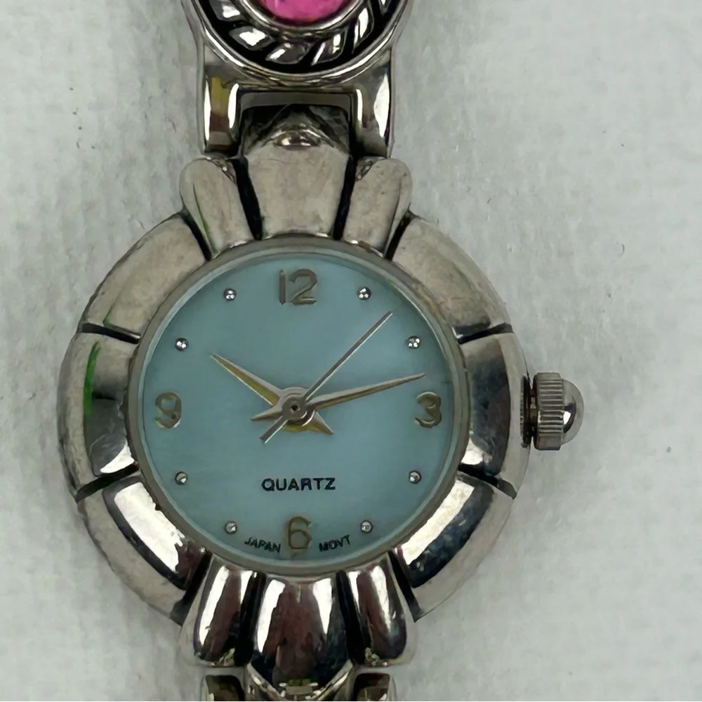 Elegant Silver Tone Quartz watch with Pink, Green, Gold and Blue Accents